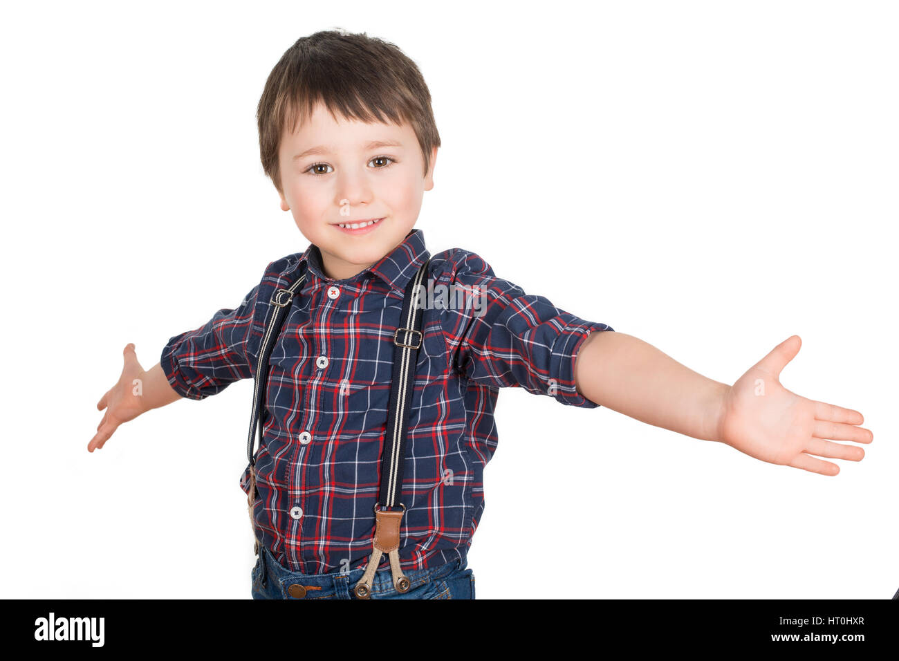 Happy positive Junge lächelnd mit seinen Armen zu verteilen. Welt liegt Ihnen zu Füßen. Auf einem weißen Hintergrund. Stockfoto