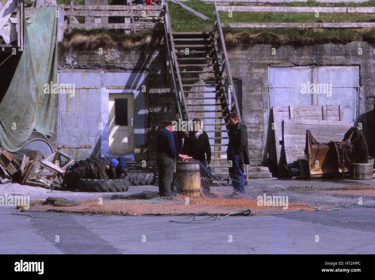 Fischer in Husavik, Island, 20. Jahrhundert. Künstler: CM Dixon. Stockfoto