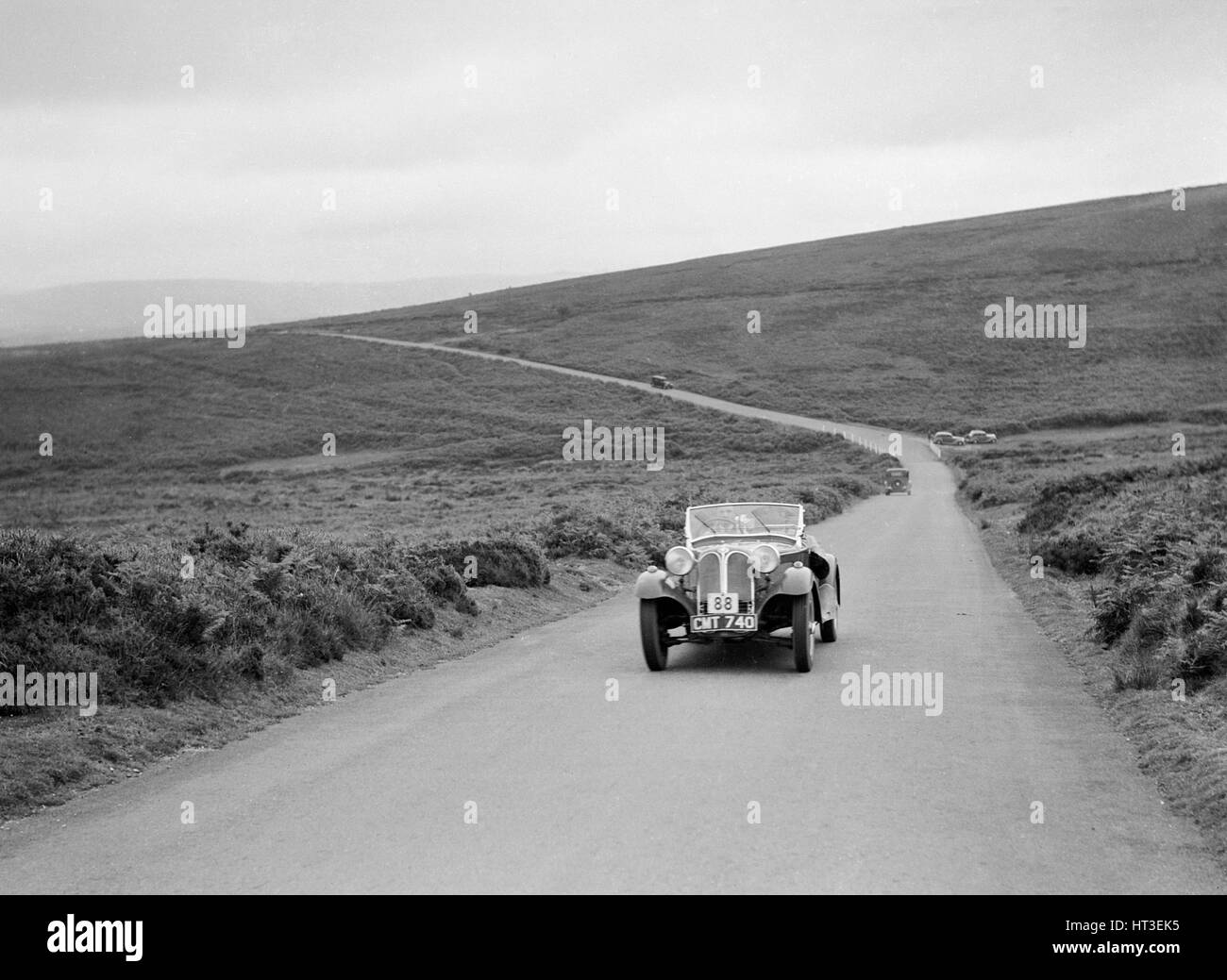 1935 Frazer-Nash BMW DN Leon im Wettbewerb bei der MCC Torquay Rallye Juli 1937. Künstler: Bill Brunell. Stockfoto