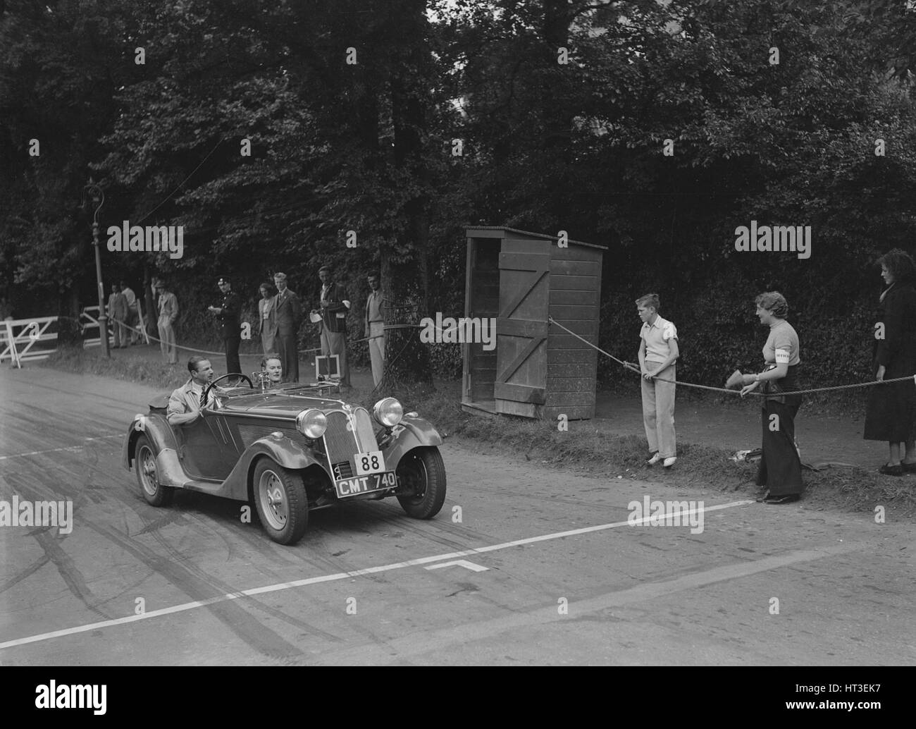 1935 Frazer-Nash BMW DN Leon im Wettbewerb bei der MCC Torquay Rallye Juli 1937. Künstler: Bill Brunell. Stockfoto