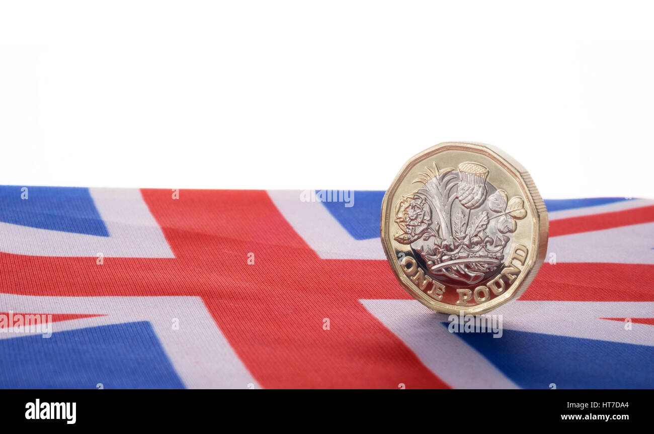 UK Währung Einheit ein Pfund-Münze auf nationale Flagge, der Union jack Stockfoto