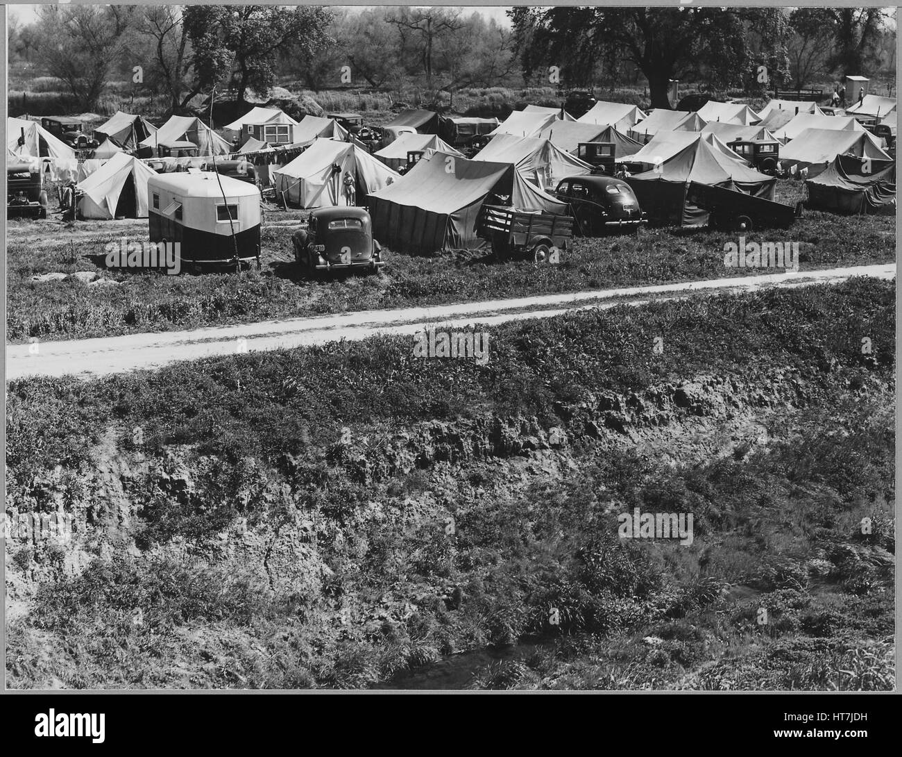 Foto von einer Arbeit des Auftragnehmers Camp für seinen Bereich Arbeiter und ihre Familien, San Joaquin, Kalifornien, 9. April 1940. Bild mit freundlicher Genehmigung Dorothea Lange / US National Archives. Stockfoto