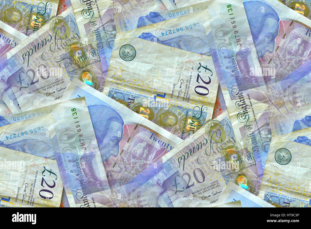 Eine zufällige Anzeige von 20-Pfund-Noten, die offizielle Währung des Vereinigten Königreichs Stockfoto