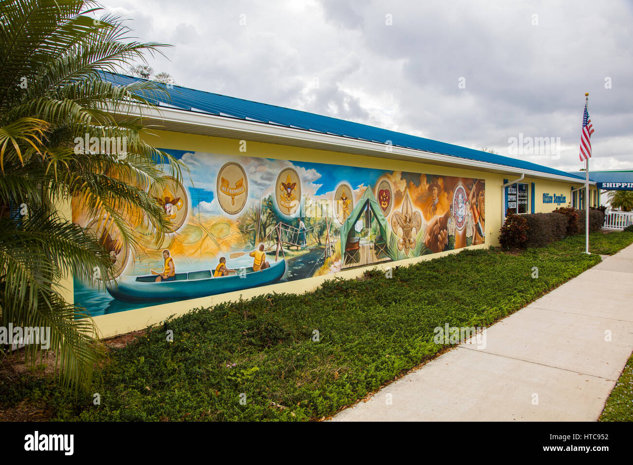 Kunst-Wandmalereien auf Outdoor-Gebäudewände in Lake Placid Florida bekannt als die Stadt von Wandmalereien Stockfoto