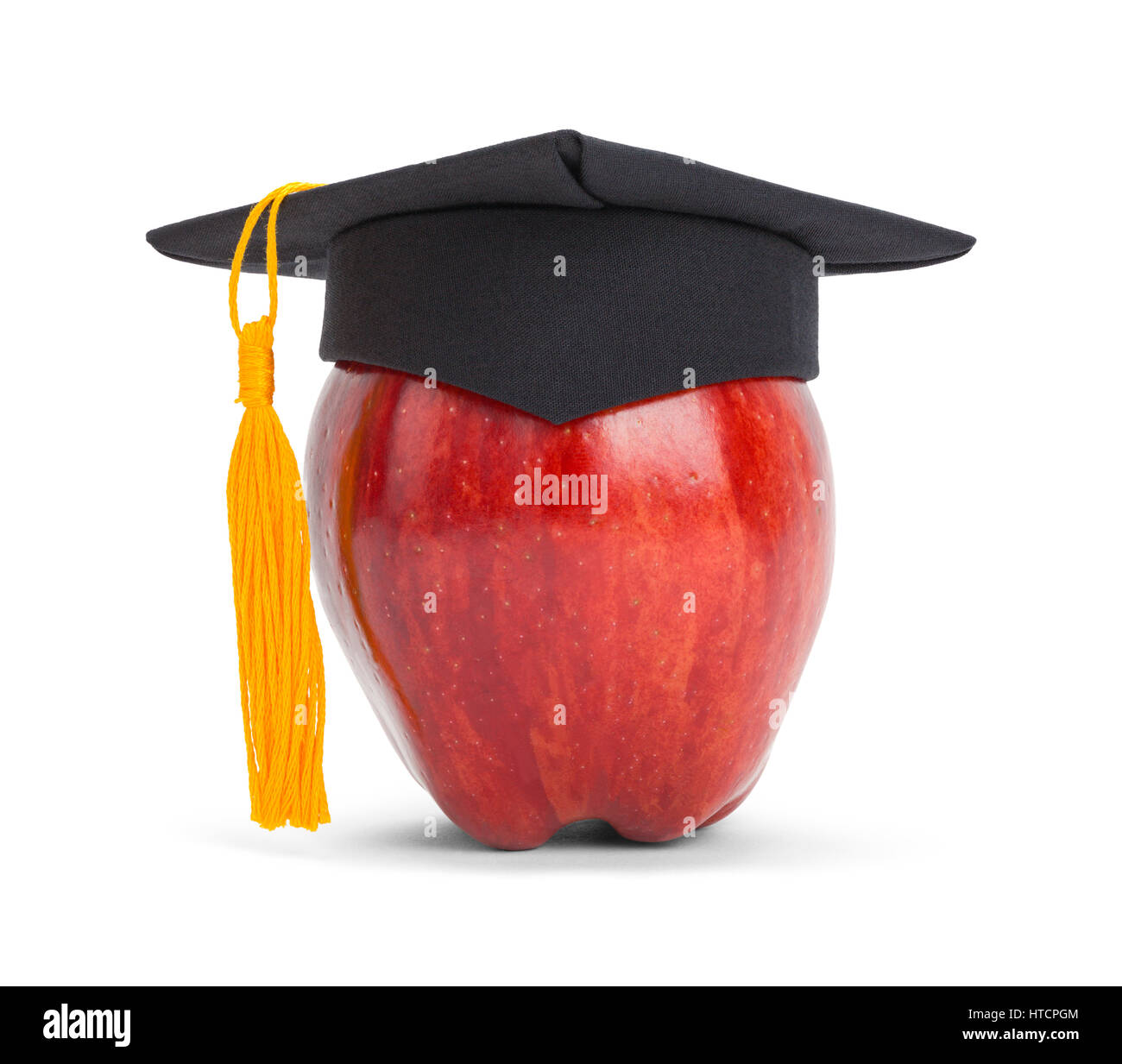 Apfel mit Graduation Hut und Gold Quaste, Isolated on White. Stockfoto