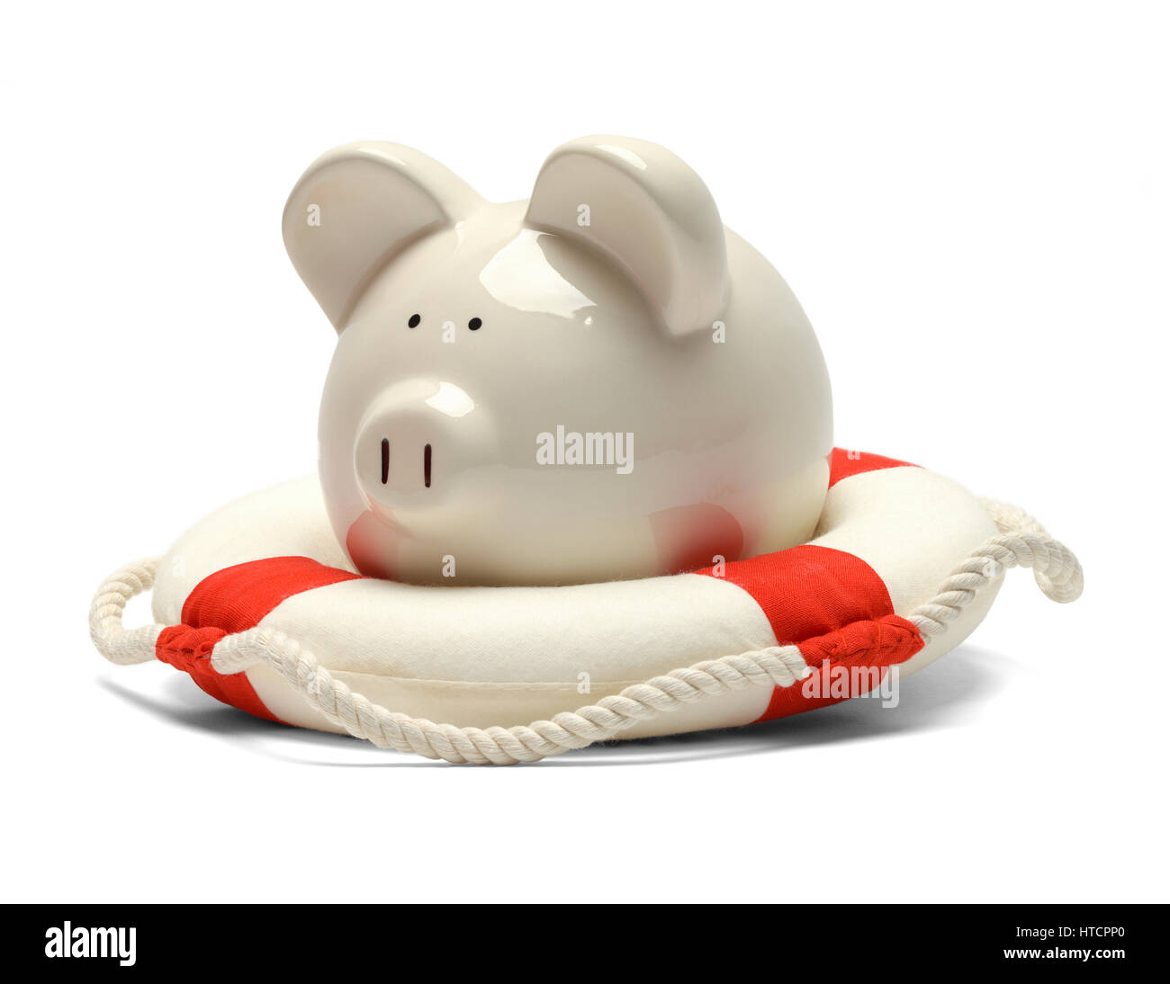 Piggy Bank gerettet durch einen Rettungsring, Isolated on White Background. Stockfoto