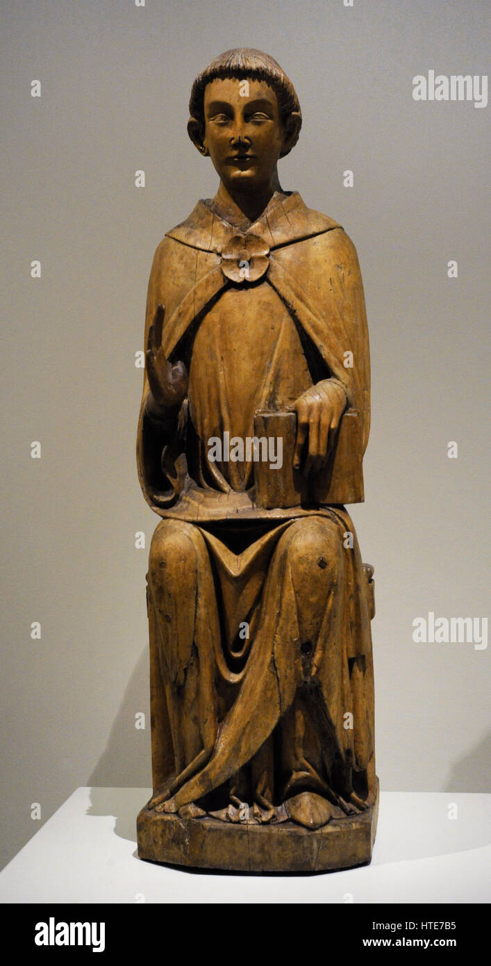 Skulptur von einem Diakon Heiliges. Ca.1300/Gruppe von Saint-Bertrand-de-Comminges, Frankreich. Gotischen Stil. Birkenholz mit polychromer bleibt. Wahrscheinlich aus der Pfarrkirche von Sant Esteve de Tredos (Val Aran). Nationalen Kunstmuseum von Katalonien. Barcelona. Katalonien. Spanien. Stockfoto