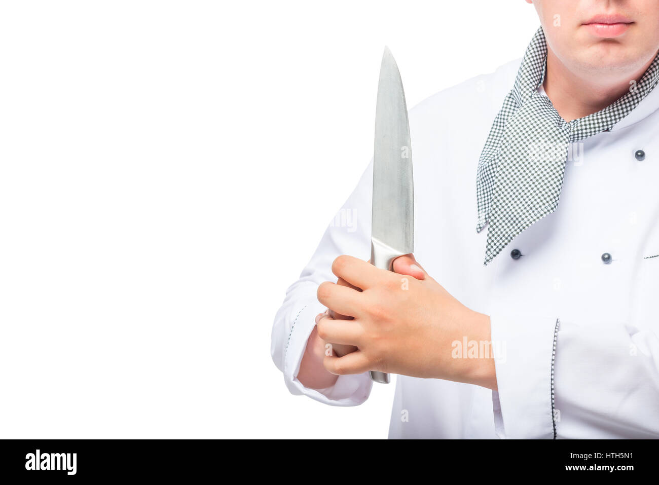 Nahaufnahme von einem Messer in den Händen von Köchen und Platz für die Eintragung auf der linken Seite Stockfoto