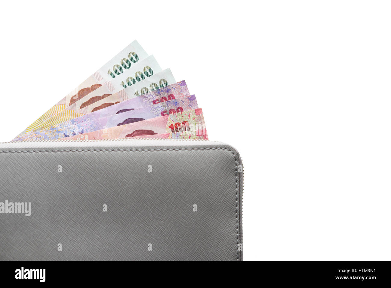 Graue Leder-Portemonnaie mit Banknoten, isoliert auf weißem Hintergrund Stockfoto
