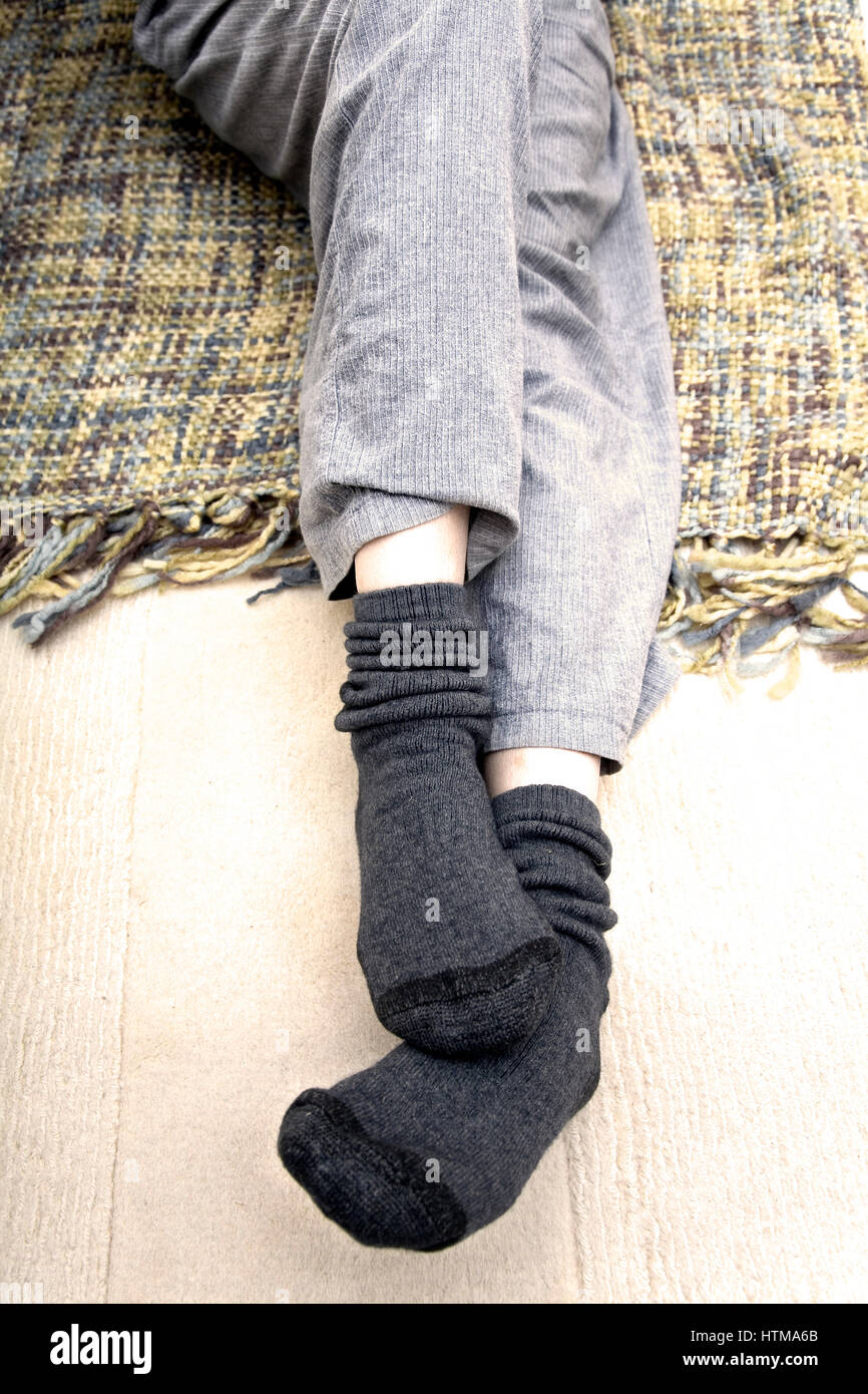 Beine und Socken Stockfoto