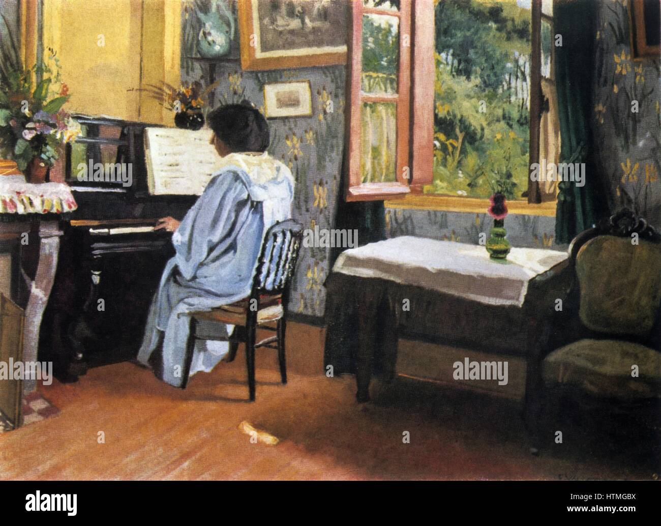 "Eine Frau am Klavier" 1904. Frau im blauen Kleid am Klavier durch ein offenes Fenster. Felix Vallotton (1865-1926), Schweizer Maler und Grafiker. Stockfoto