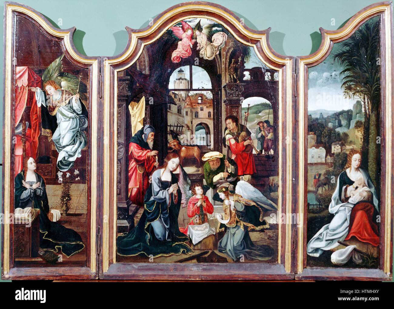 "Anbetung der Hirten" Triptychon zurückzuführen auf flämischen Künstler Cornelis Englebrechtsen (Engelberts 1468-1533). Linke Tafel zeigt die Verkündigung; Zentrum der Anbetung im Stall mit Maria, Joseph, Jesuskind, Engel, Hirten (mit Dudelsack) und Ochsen; Richtige Jungfrau und das Kind. Öl auf Holz. Stockfoto