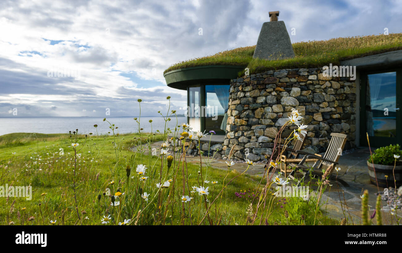 Stein-Strandhaus entlang der Küste der Insel Harris Stockfoto