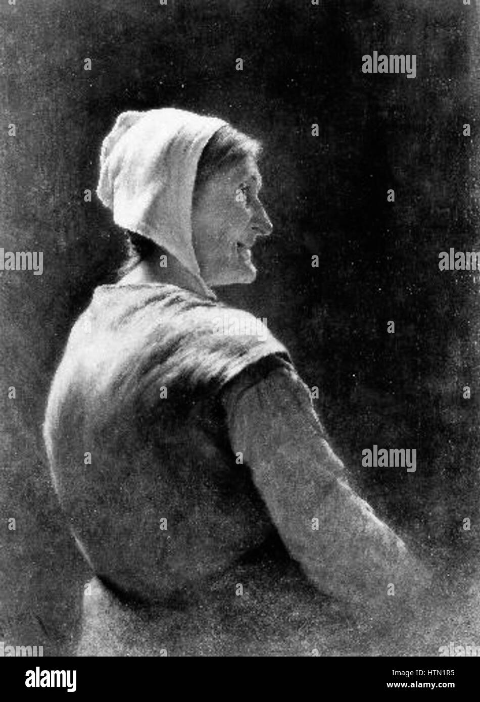 Lev Lerchs „Stara selka V bilem cepci“ (Frau aus dem alten Dorf in einem weißen Kopftuch) fängt eine traditionelle ländliche Figur in einem historischen Stil ein. Das Gemälde präsentiert die Frau auf einfache, aber ausdrucksstarke Art und Weise, wobei sie sich auf ihre Kleidung und ihren Gesichtsausdruck konzentriert. Stockfoto