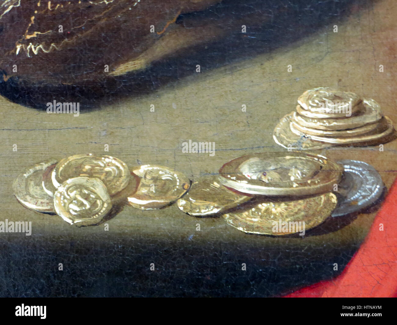 „Le Tricheur à l'as de carreau“ von Georges de La Tour ist ein berühmtes Gemälde, das für seine dramatische Beleuchtung und detaillierte Darstellung eines Kartenspiels bekannt ist. Die Arbeit konzentriert sich auf einen Moment der Täuschung, in dem ein Mann beim Betrügen erwischt wird. Die Verwendung von Hell-Dunkel-Technik unterstreicht die Spannung zwischen den Spielern und verbessert den Realismus der Szene. Stockfoto