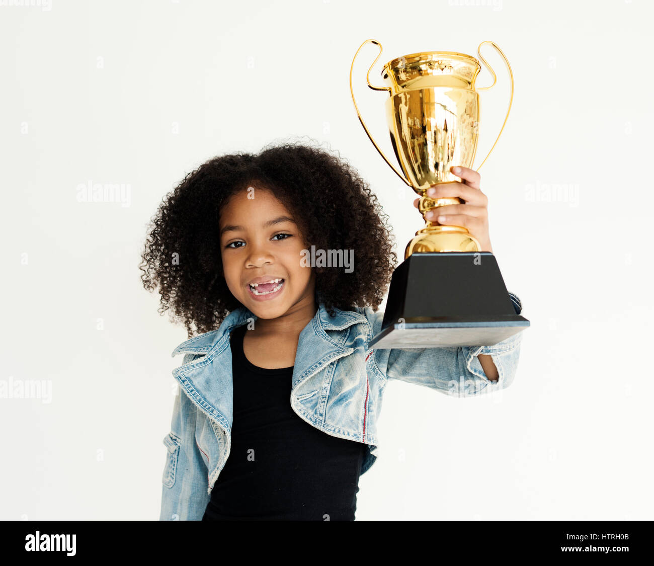 Girl Holding Trophy Sieger Erfolg Sieger Stockfoto