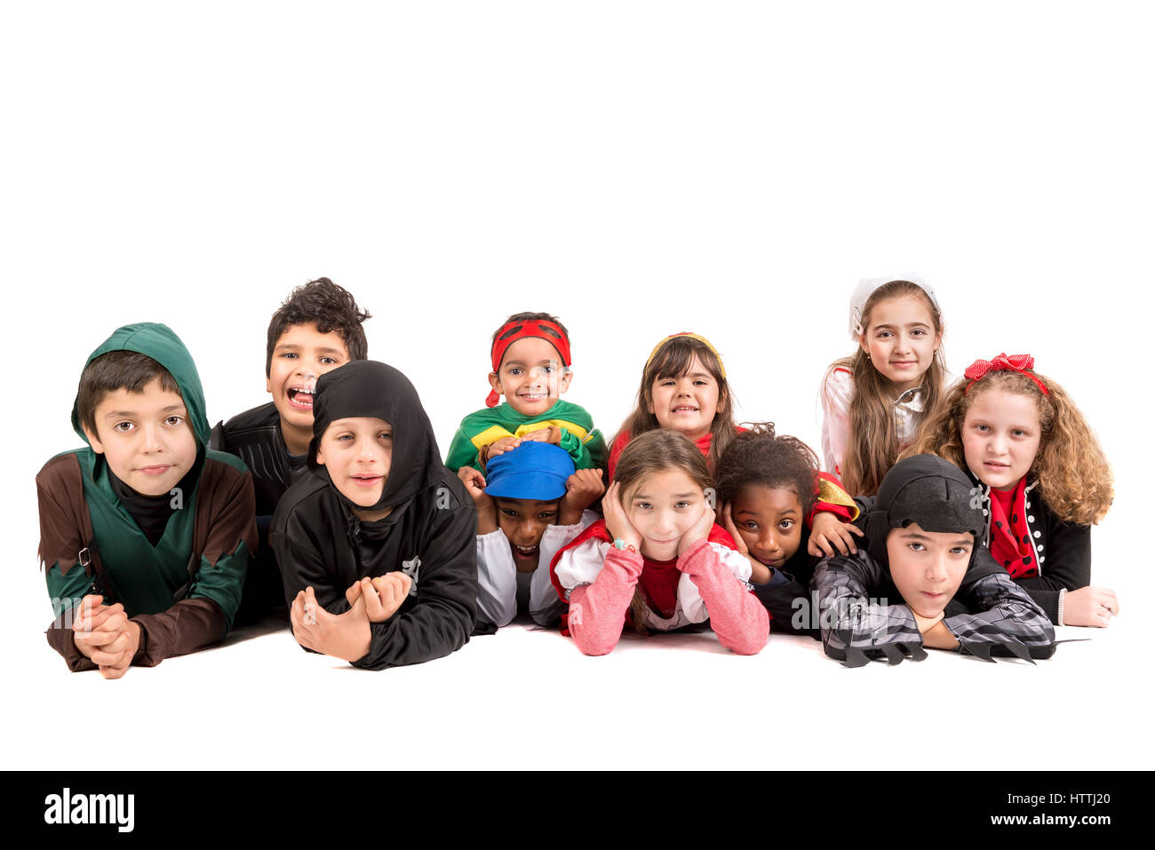 Gruppe von Kindern im Halloween/Canaval Kostüme isoliert Stockfoto