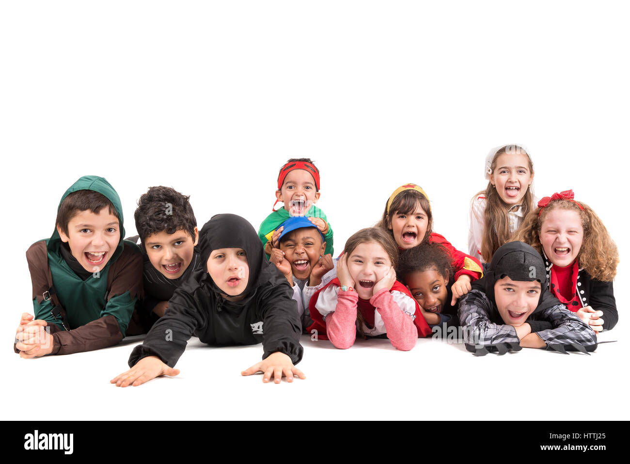 Gruppe von Kindern im Halloween/Canaval Kostüme isoliert Stockfoto