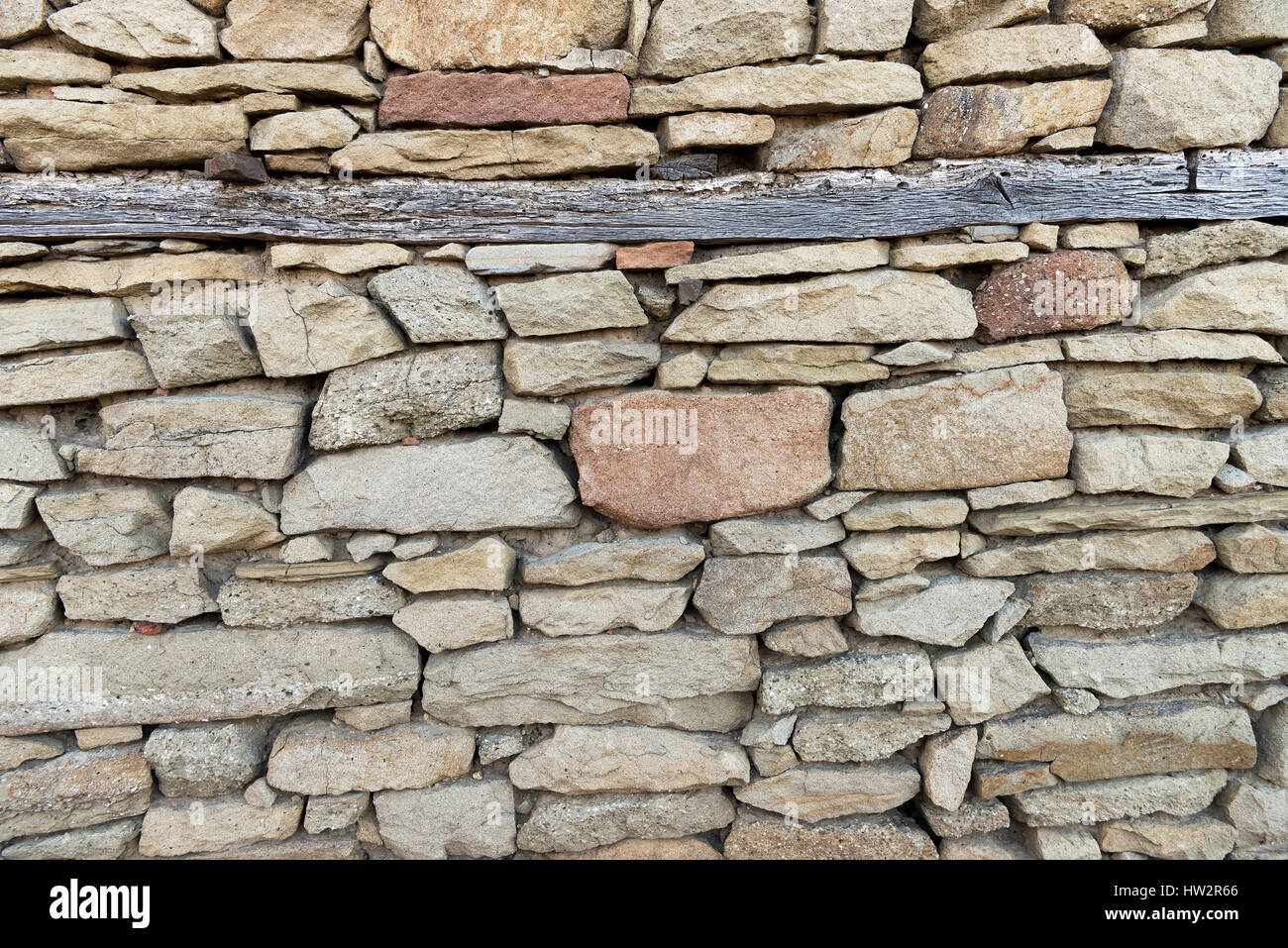 Stein Wand Textur mit Hölzern Stockfoto