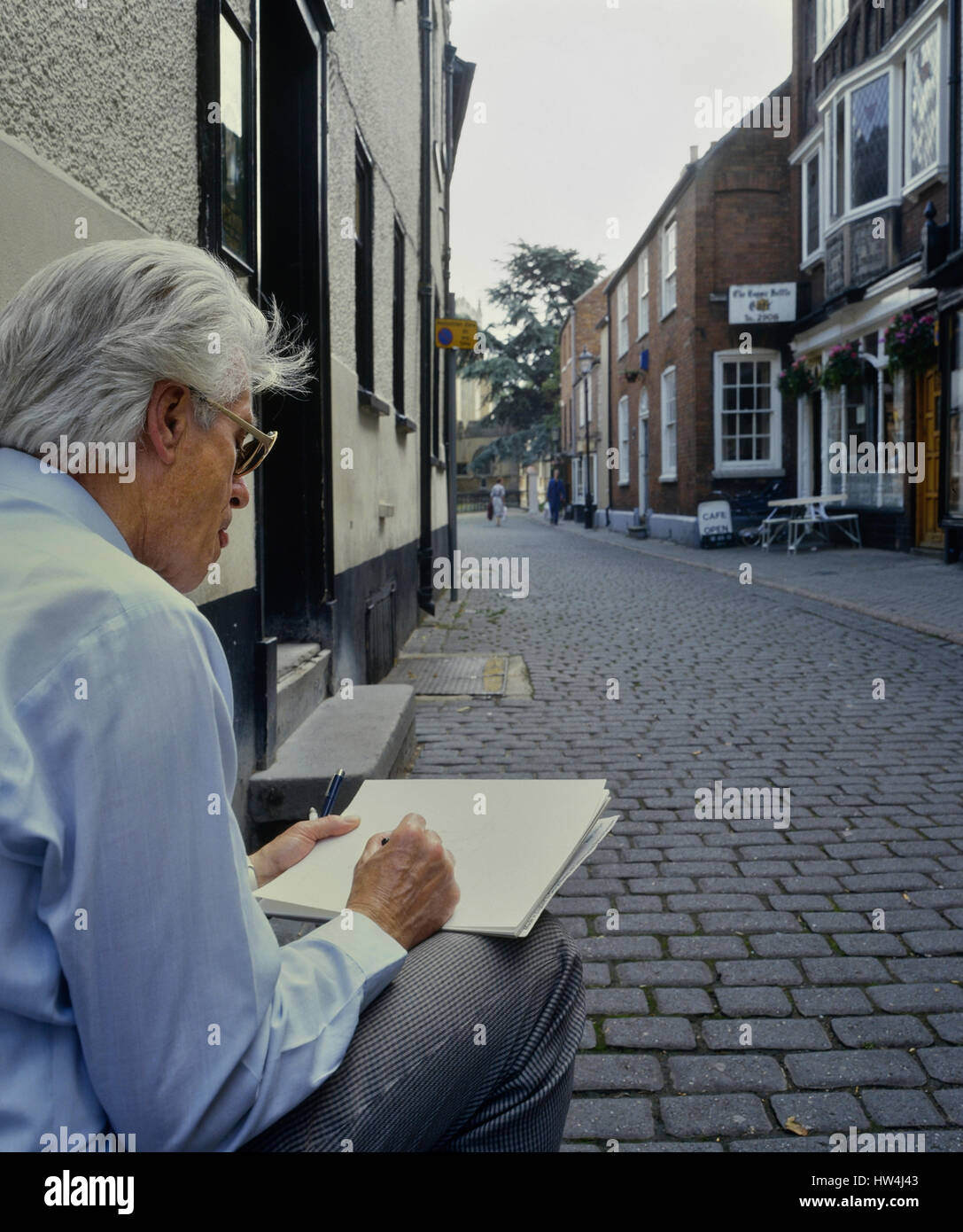 Künstler, die Zeichnung in der Church Street. Melton Mowbray. Leicestershire Stockfoto