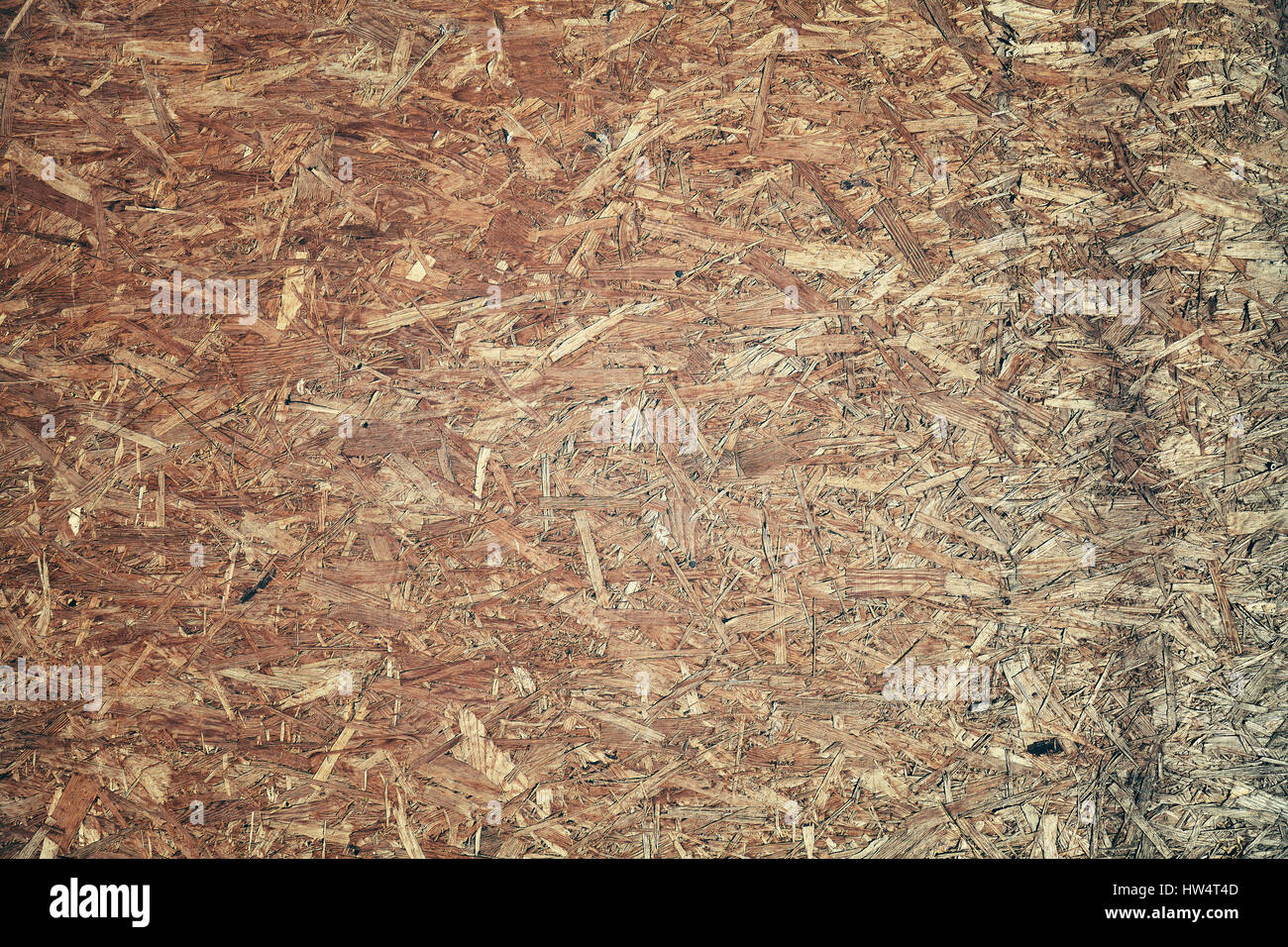 Ein altes orientierten Strand Board (OSB), Faserplatten Hintergrund Textur. Stockfoto