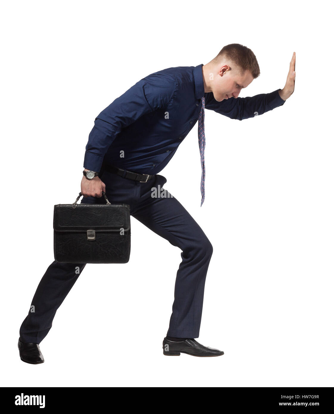 Junge Unternehmer drängen Wand, auf weiß Stockfoto