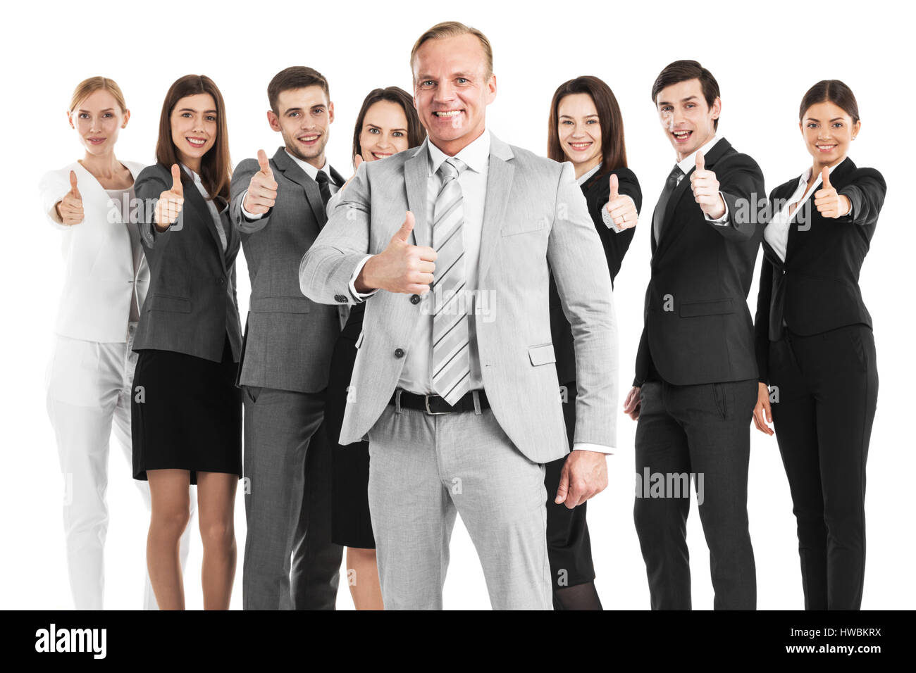 Business-Team zeigt Daumen oben isoliert auf weißem Hintergrund Stockfoto