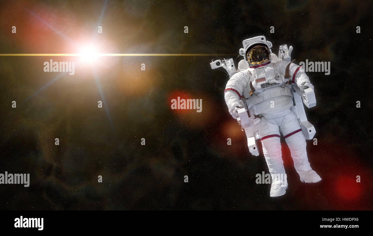 Astronaut in einem EMU (Extravehicular Mobility Unit) vor ein heller Stern in einem bunten Nebel schweben Stockfoto