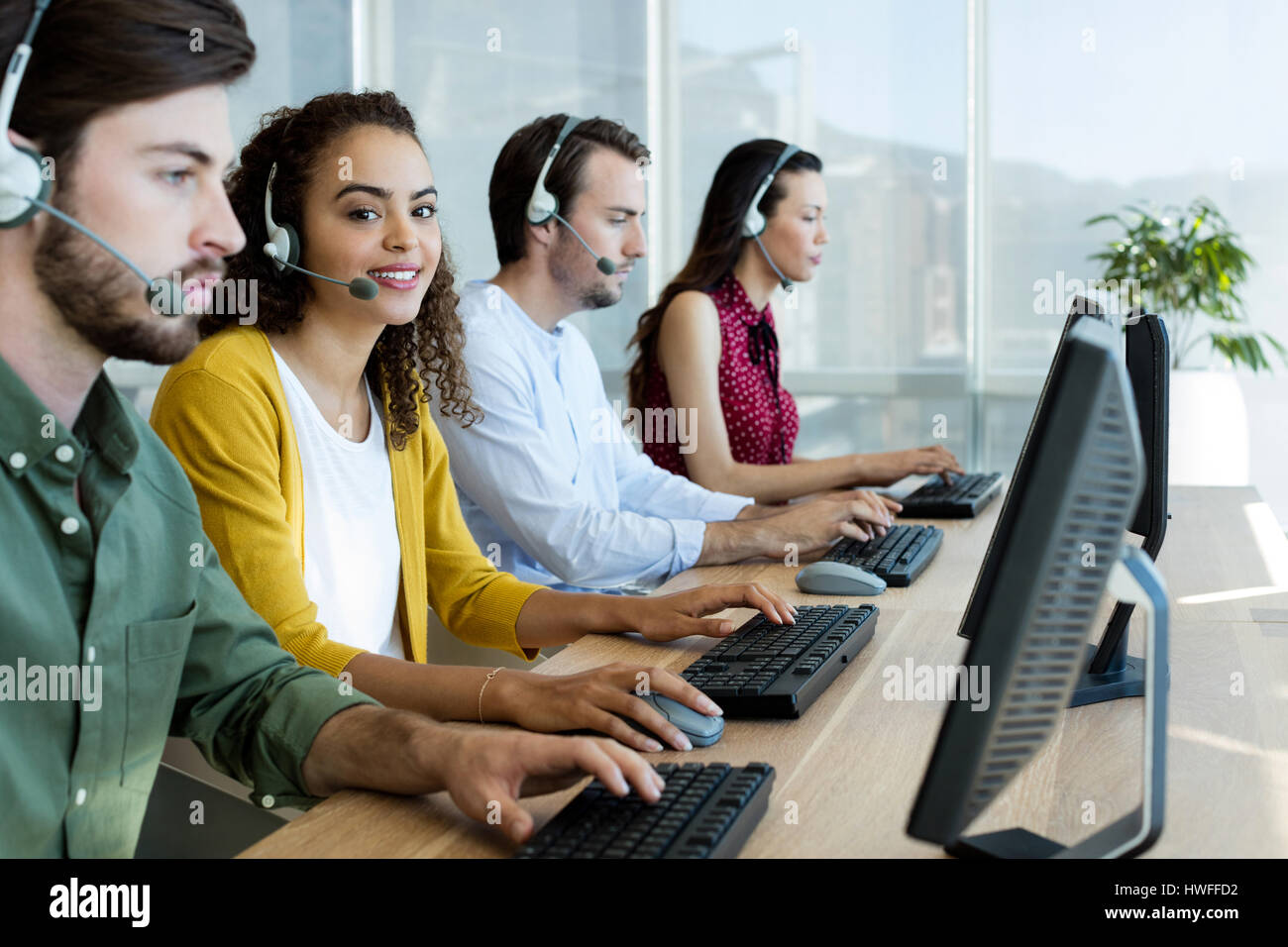 Kunden-Service-Führungskräfte arbeiten im Büro Stockfoto