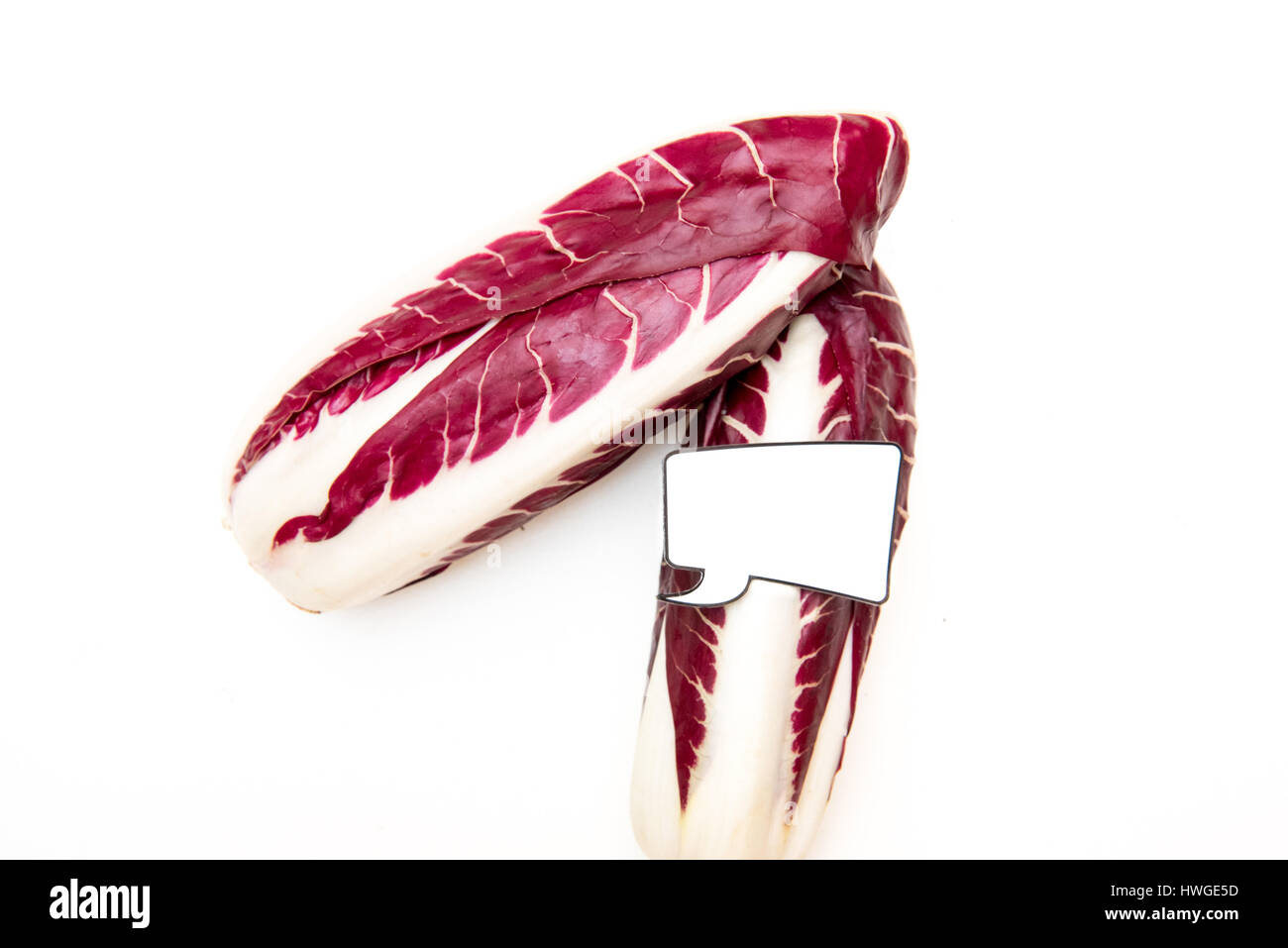 Einige frische rohe rote Chicorée und lustigen comic-Style-Label für Marktpreis Stockfoto