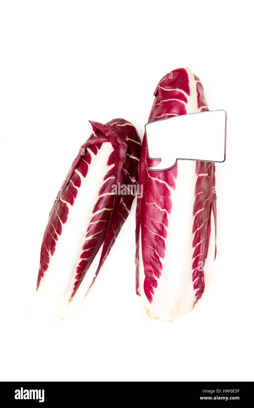 Einige frische rohe rote Chicorée und lustigen comic-Style-Label für vertikale Marktpreis Stockfoto
