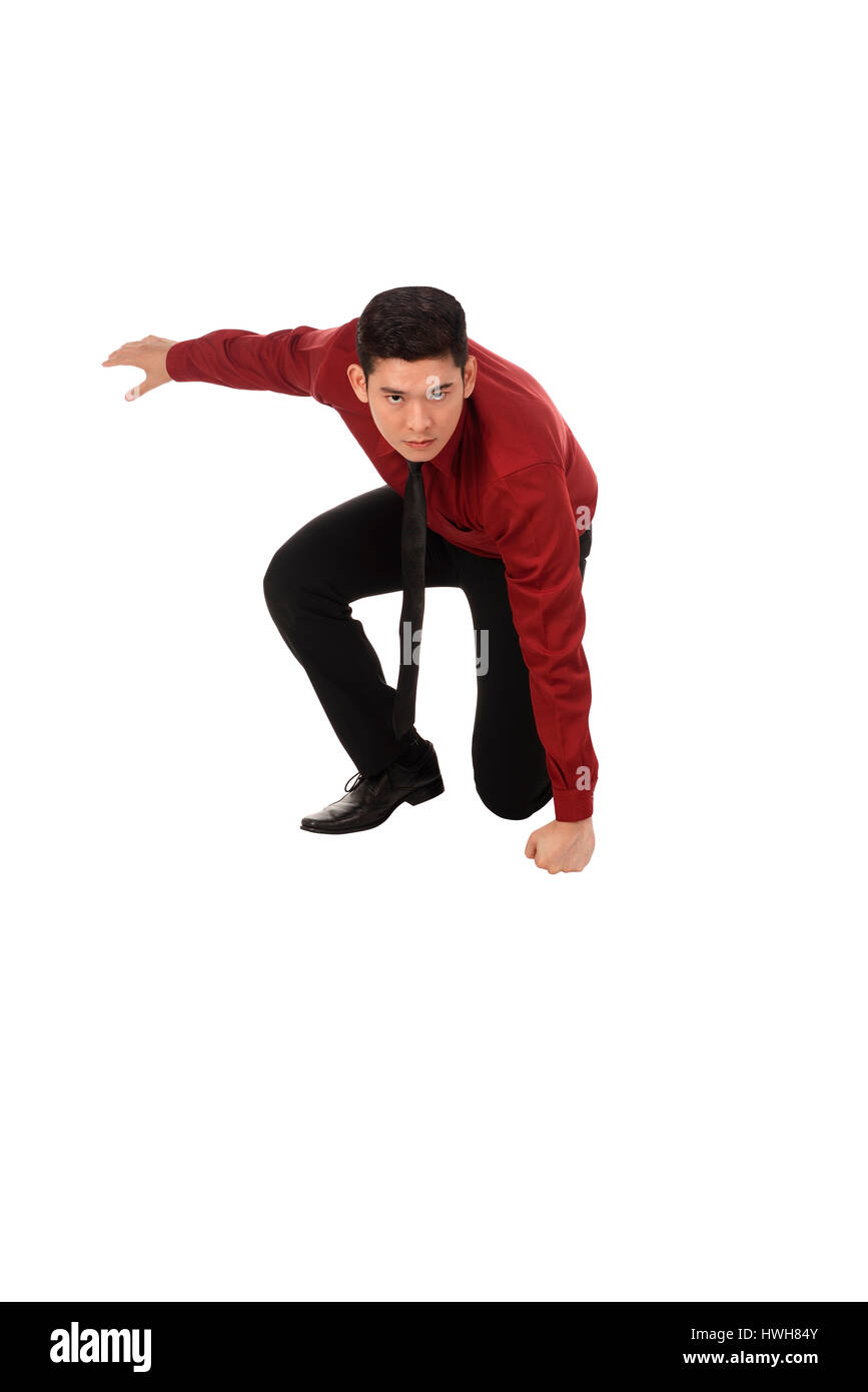 Asiatische Geschäftsmann mit dem Kampf gegen Geste isoliert auf weißem Hintergrund Stockfoto