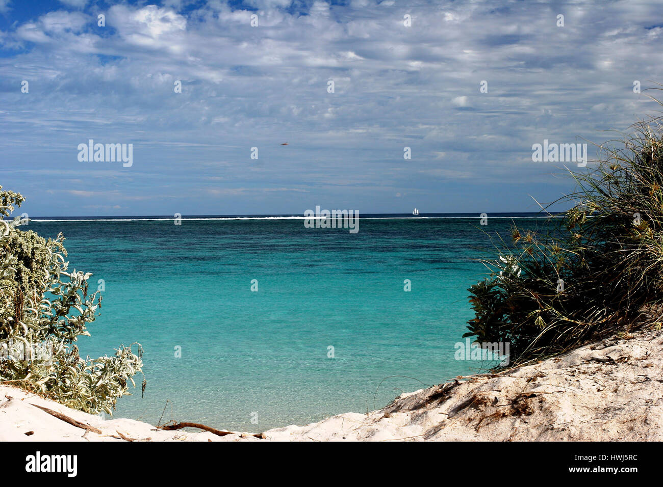 Unberührte türkisfarbenen Gewässer durch die Dünenlücke am Ningaloo Reef Western Australia Stockfoto