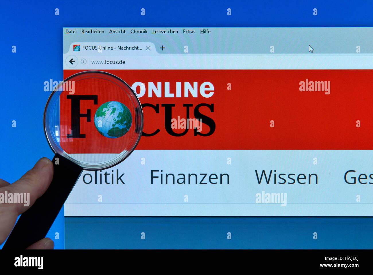 Focus Online, Website, Internet, Bildschirm, Lupe, Hand Stockfoto