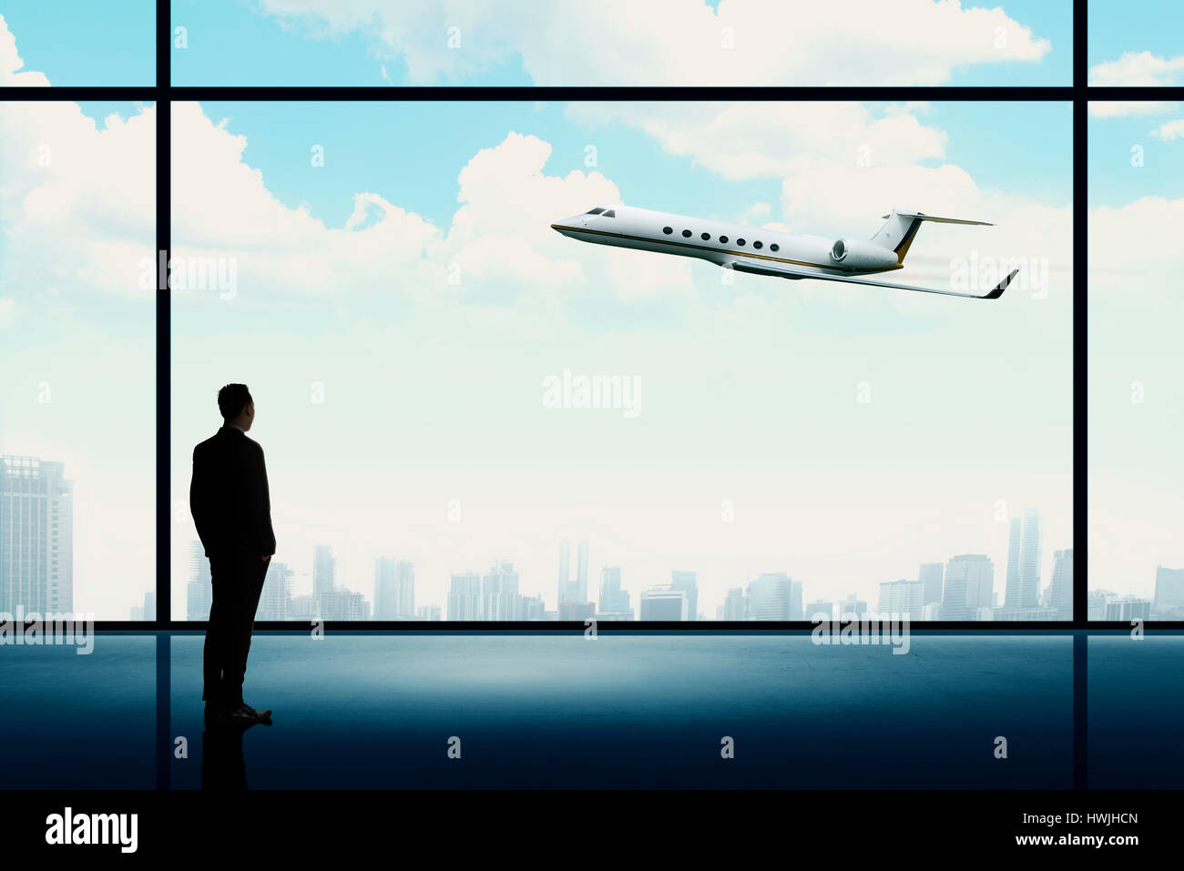 Mann sucht auf dem Privat-Jet. Karriere als Geschäftsmann konzeptionellen Stockfoto