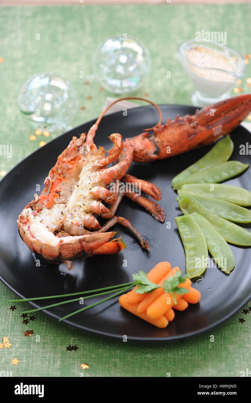 Homard Rôti au vier au Beurre salé Stockfoto