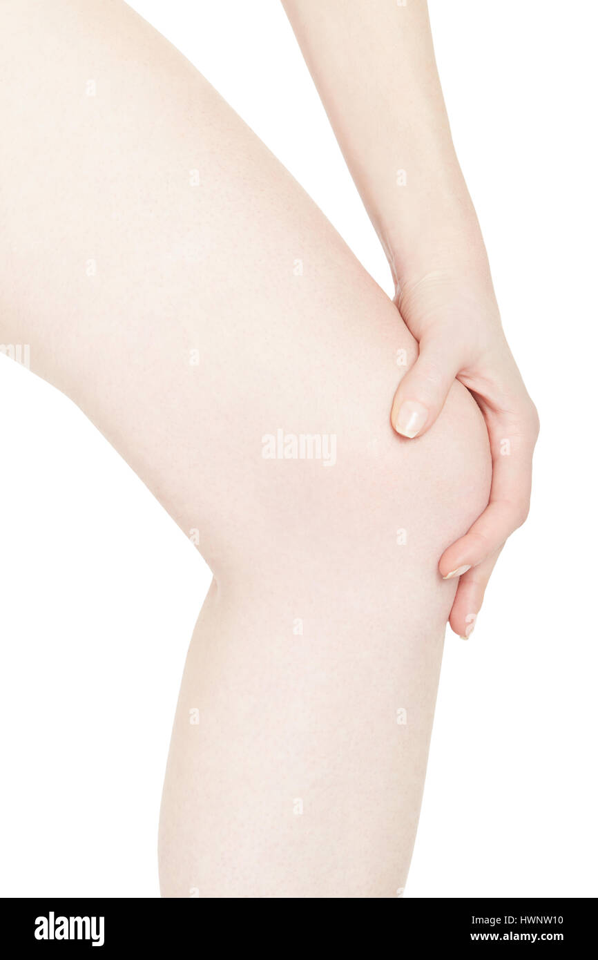 Junge Frau Bein mit Schmerzen im Knie isoliert auf weiss, Clipping-Pfad Stockfoto