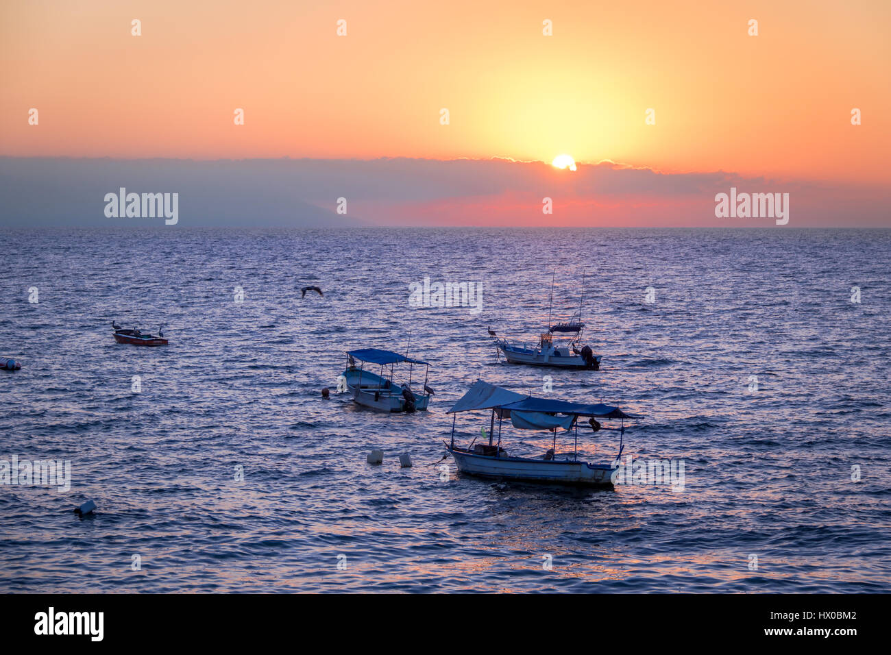 Boote bei Sonnenuntergang - Puerto Vallarta, Jalisco, Mexiko Stockfoto