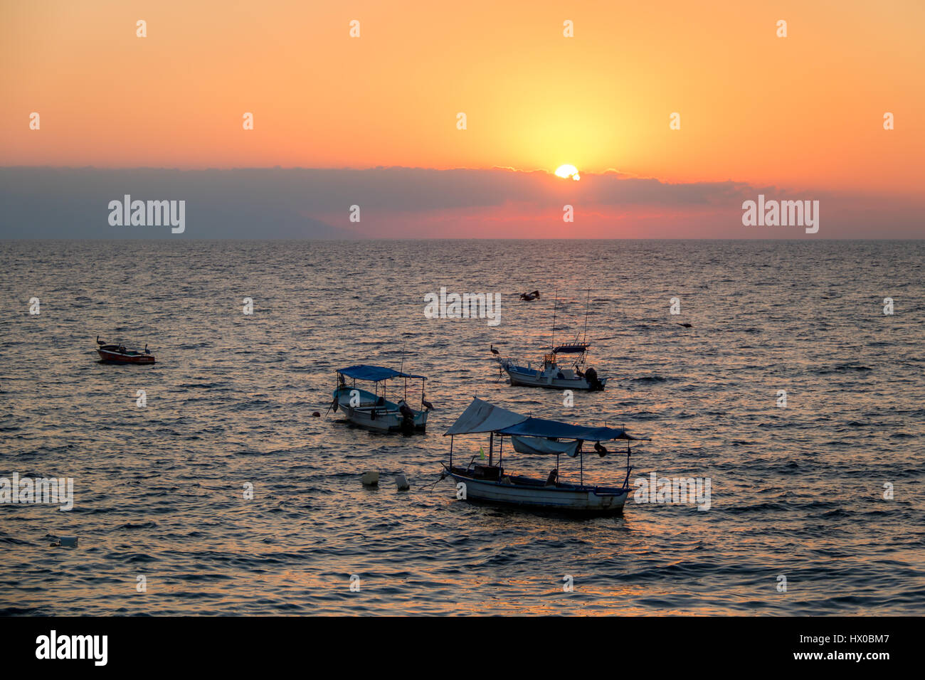 Boote bei Sonnenuntergang - Puerto Vallarta, Jalisco, Mexiko Stockfoto