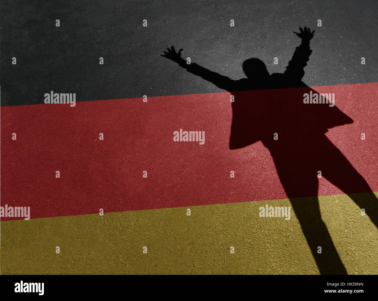 Deutschland-Erfolgskonzept wie der Schatten einer Person auf die Farben der Flagge feiert einen Sieg oder deutschen Geschäftsmöglichkeit. Stockfoto