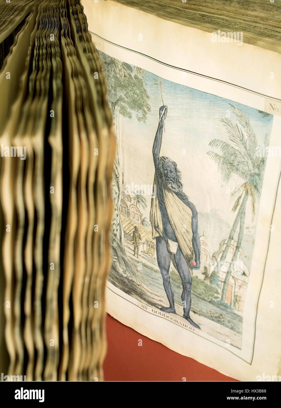 Das Buch "Collection von zweihundert und fünfzig farbigen Radierungen" von Francois Balthazar Solvyns (1760-1824) richtet sich an einer Seite mit einer farbigen Ätzen der Asket mit seinen rechten Arm erhoben, 1796. Mit freundlicher Genehmigung National Library of Medicine. Stockfoto