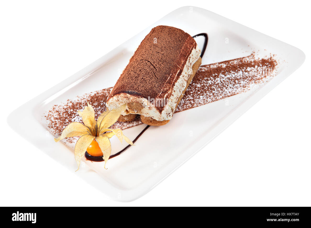 kuchen tiramisu auf rechteckige keramikplatte dekoriert mit beeren physalis isoliert auf weissem hintergrund stockfotografie alamy