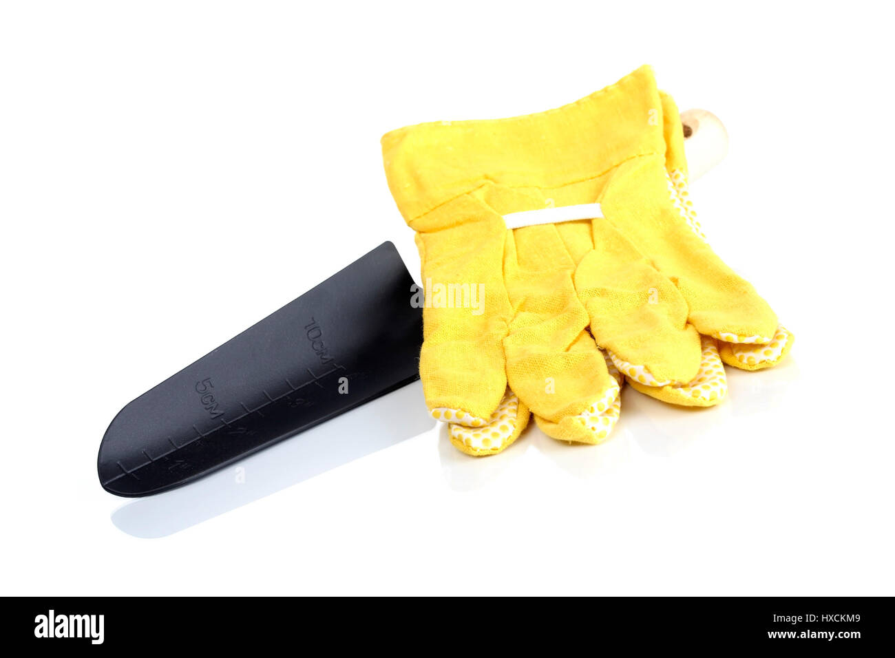 Pflanzschaufel und Handschuhe, Pflanzschaufel Und Handschuhe Stockfoto