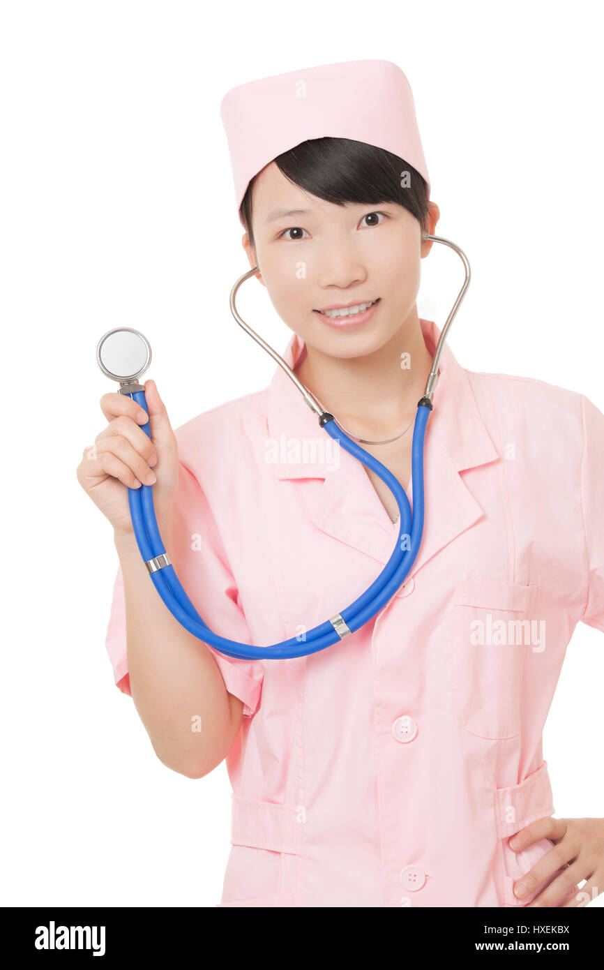 Ein Porträt einer schönen chinesischen Krankenschwester in einem rosa Uniform isoliert auf weißem Hintergrund Stockfoto