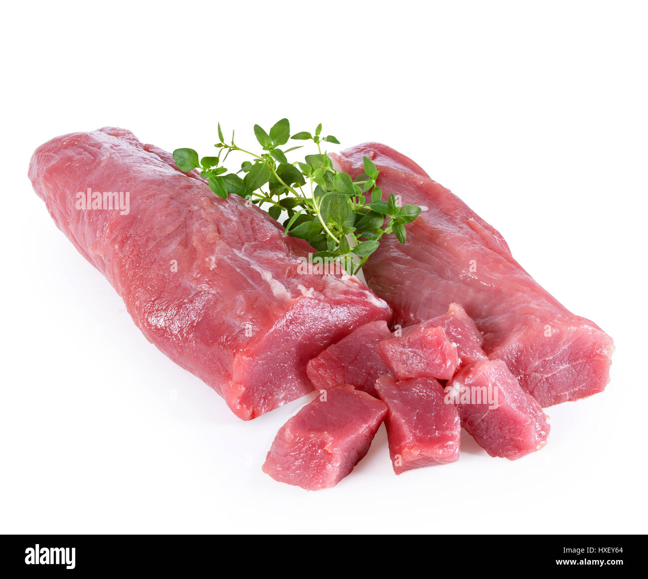 Rohes Fleisch von Parma Schwein, Schweinefleisch, Kräuter als Dekoration Stockfoto