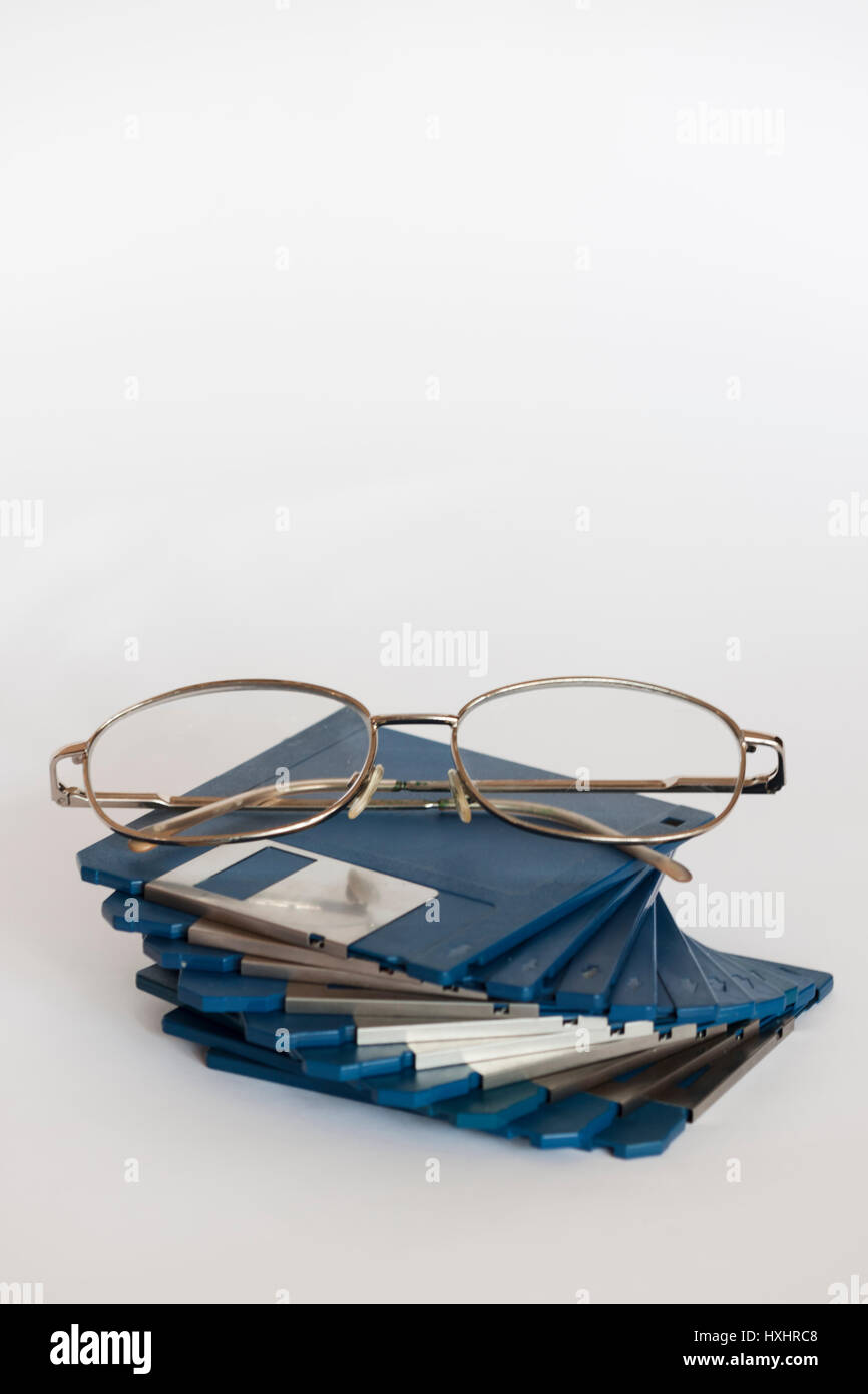 Brillen auf Disketten Stockfoto