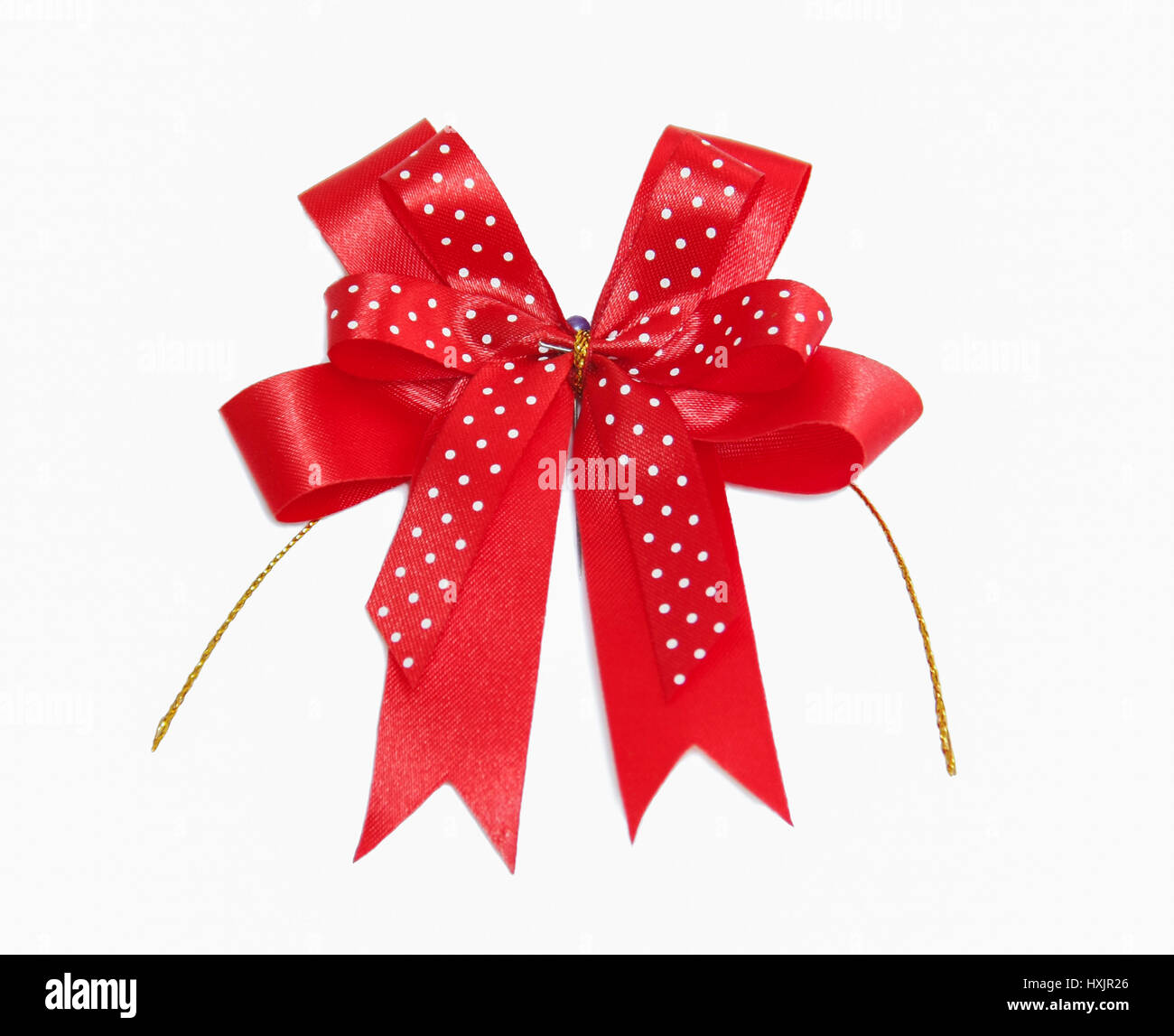 roter Stoff Schleife haben weiße Flecken Stockfoto