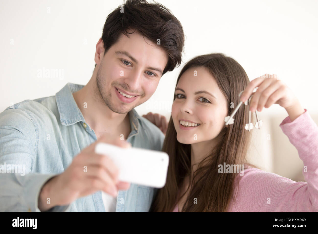 Porträt der schönen paar verdienen Selfie im mobilen Betrieb Schlüssel Stockfoto