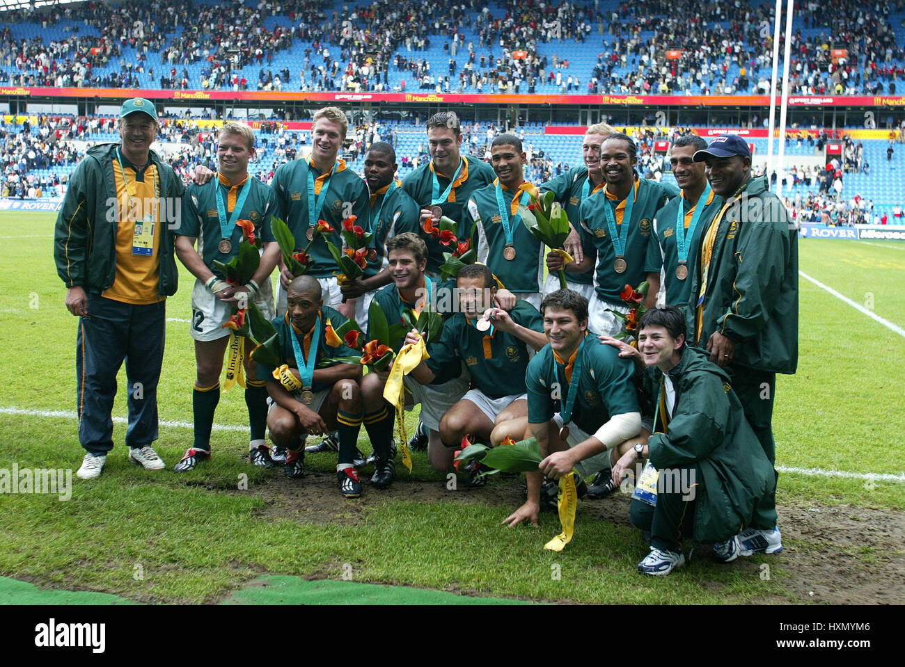 Südafrika zu feiern BRONZE COMMONWEALTH GAMES 2002 MANCHESTER ENGLAND 07 August 2002 Stockfoto