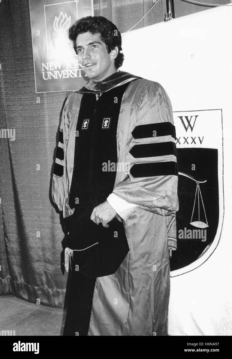 John bei seinem Abschluss an der New York University Law School in New York City.  © RTalensick / MediaPunch Stockfoto